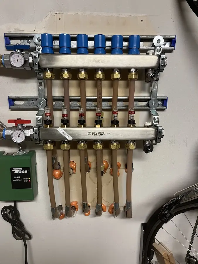 Plumber performing Water Heater Repair at a residential property in Spring Grove